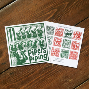 Eleven Pipers Piping Greetings Card lino cut by Kate Guy