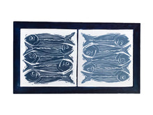 Load image into Gallery viewer, Two Tiles Printed With Linocut Print of Five Fish in Light and Dark Blue Framed in English Oak Painted Dark Blue Trivet by Kate Guy
