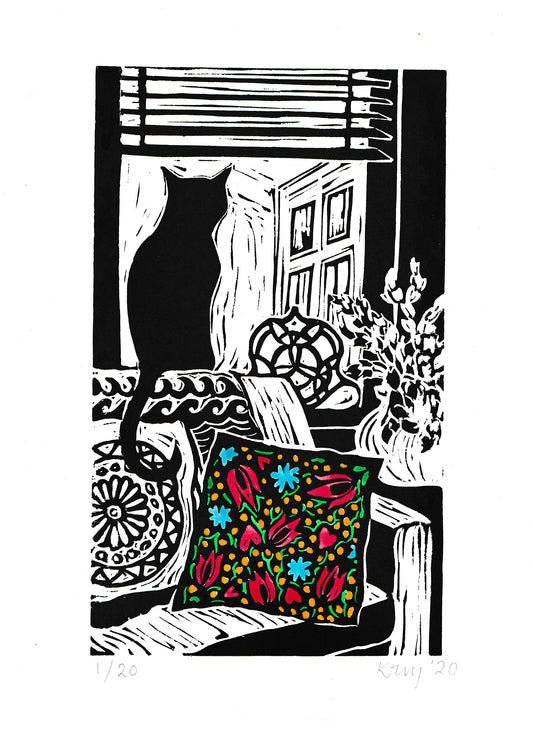 Lockdown cat with mexican cushion lino cut print by Kate Guy
