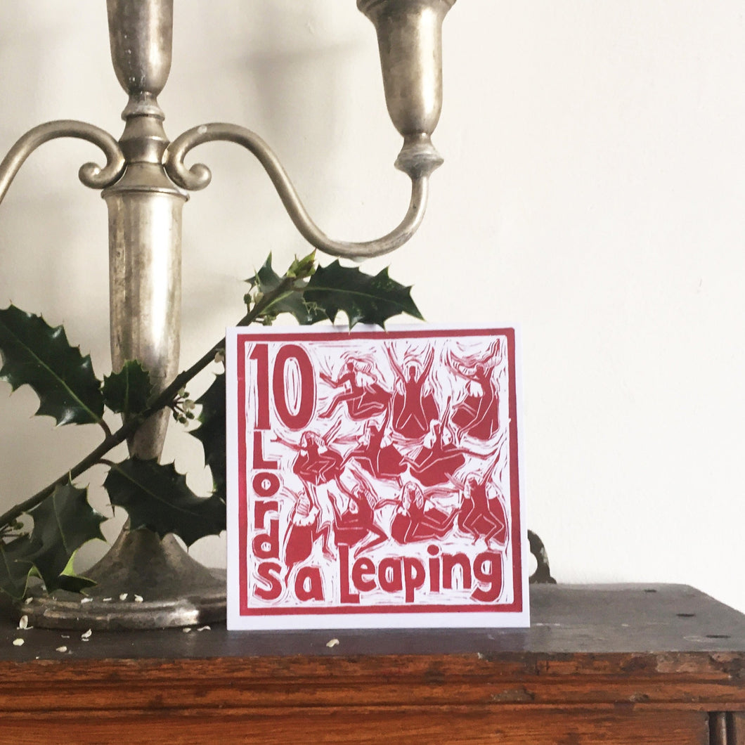 Ten Lords a Leaping Greetings Card lino cut by Kate Guy