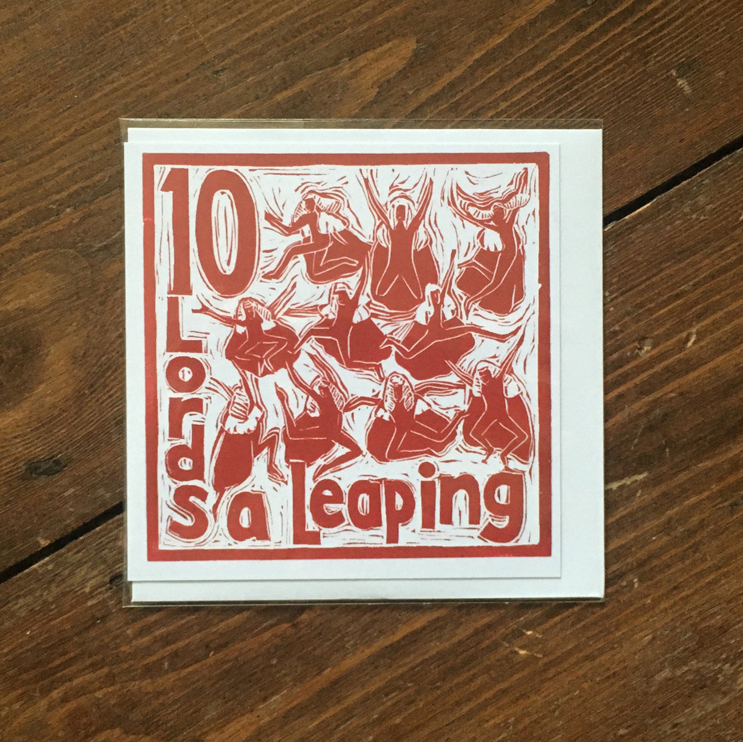 Ten Lords a Leaping Greetings Card lino cut by Kate Guy
