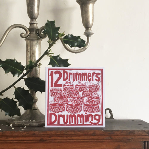 Twelve Drummers Drumming Greetings Card lino cut by Kate Guy