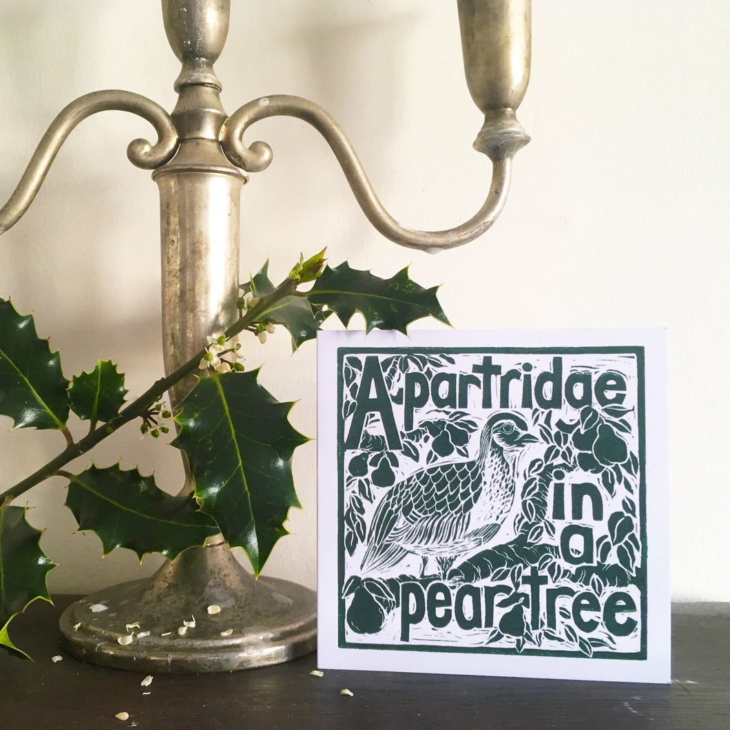 A Partridge in a pear tree greetings card lino cut by Kate Guy