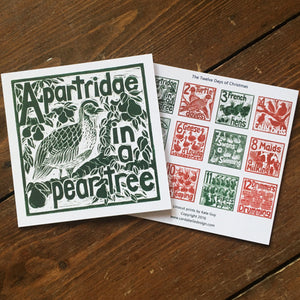 A Partridge in a pear tree greetings card lino cut by Kate Guy