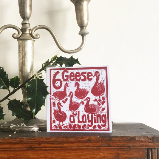 Six Geese a Laying Greetings Card lino cut by Kate Guy