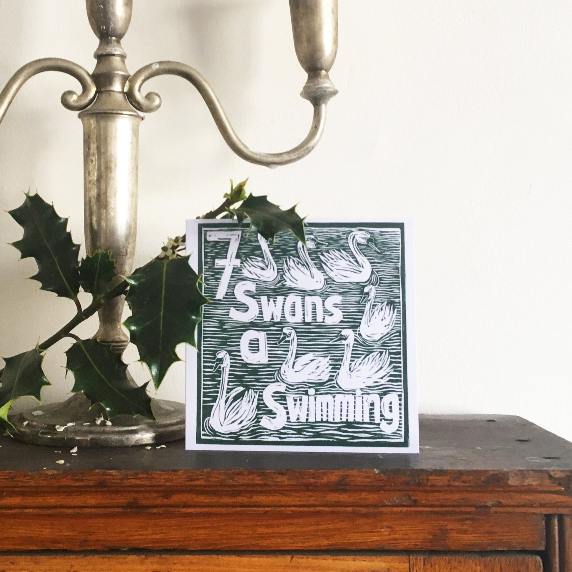 Seven Swans a Swimming Greetings Card lino cut by Kate Guy