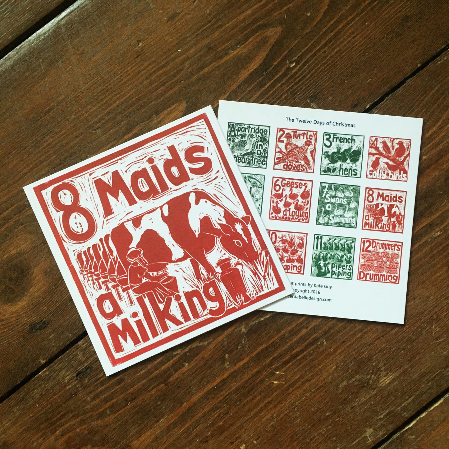 Eight Maids a Milking Greetings Card lino cut by Kate Guy