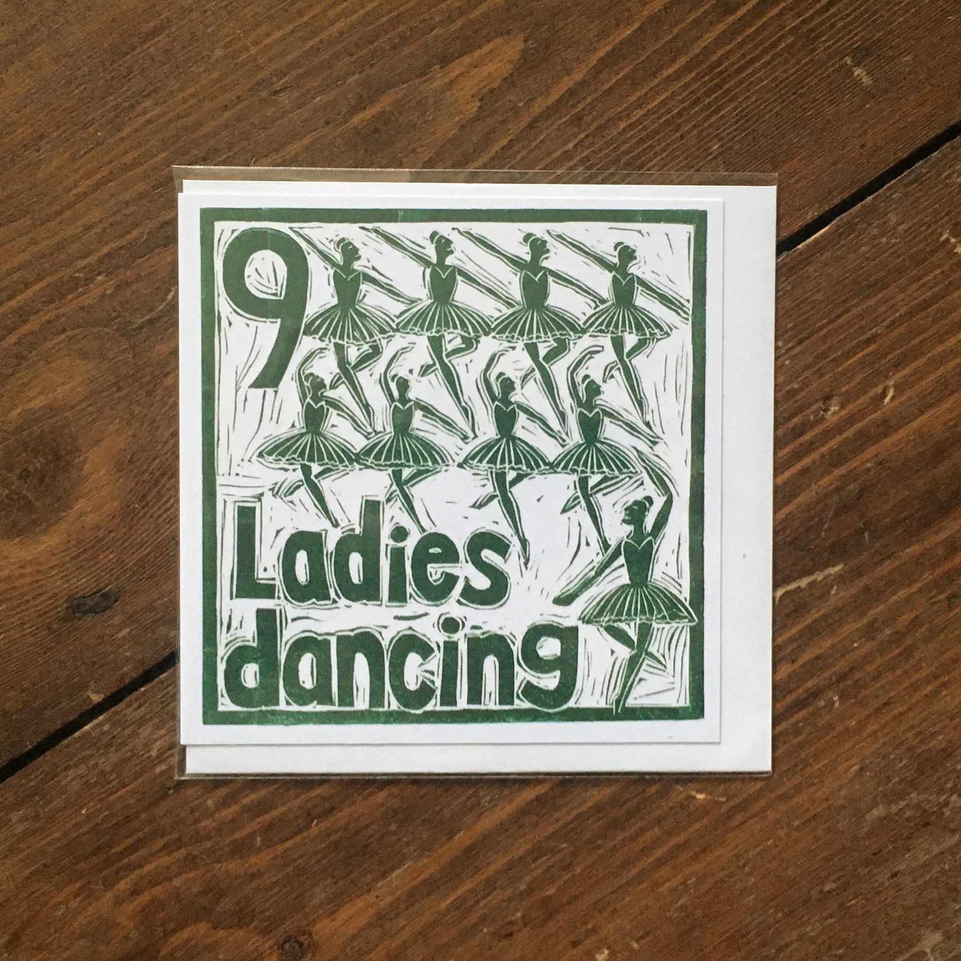 Nine Ladies Dancing Greetings Card lino cut by Kate Guy