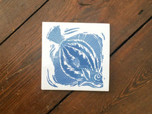 Load image into Gallery viewer, Plaice handmade tile trivet lino cut by Kate Guy in dark blue
