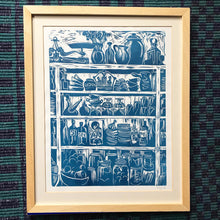 Load image into Gallery viewer, Framed Print of a French Country Kitchen Linocut Print Shelves of Home Grown Produce and Kitchen Equipment in a French Blue
