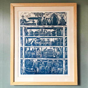 Framed Print of a French Country Kitchen Linocut Print Shelves of Home Grown Produce and Kitchen Equipment in a French Blue