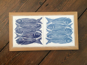 Sardines tile trivets in oak frame lino cut by Kate Guy in dark and pale blue