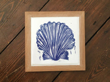 Load image into Gallery viewer, Scallop shell framed tile trivet in Prussian blue lino cut print by Kate Guy
