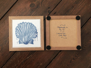Scallop shell framed tile trivet in Prussian blue lino cut print by Kate Guy showing front and back