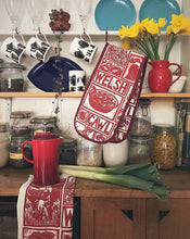 Load image into Gallery viewer, Welsh Cawl Gift Set Tea Towel Apron and Oven gloves wrapped in tissue presented in a gift box
