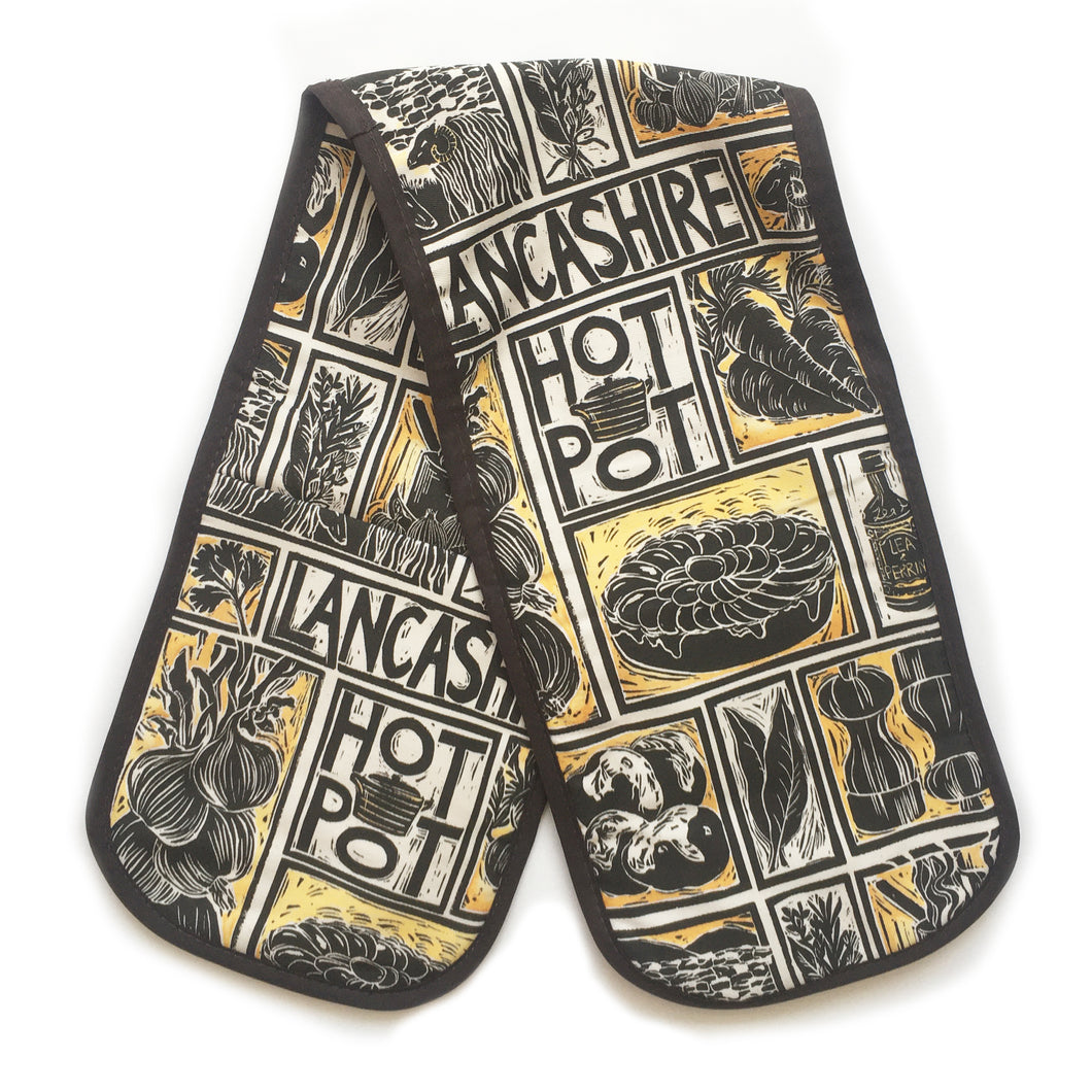 Lancashire Hot pot illustrated recipe double oven glove lino cut by Kate Guy with cooking instructions in the tag