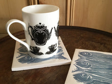 Load image into Gallery viewer, Sardines lino cut handmade tile trivet by Kate Guy
