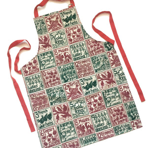 The Twelve days of Christmas organic cotton apron lino cut by Kate Guy