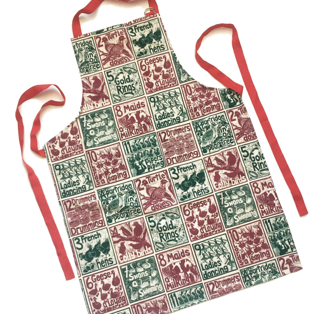 The Twelve days of Christmas organic cotton apron lino cut by Kate Guy