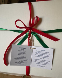 Welsh Cawl Gift Set Tea Towel Apron and Oven gloves wrapped in tissue presented in a gift box