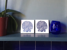 Load image into Gallery viewer, Scallop shell tile trivets in pale and Prussian blue lino cut print by Kate Guy
